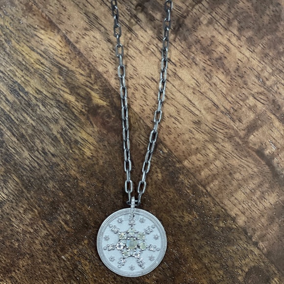 black titanium necklace with black titanium charm with...